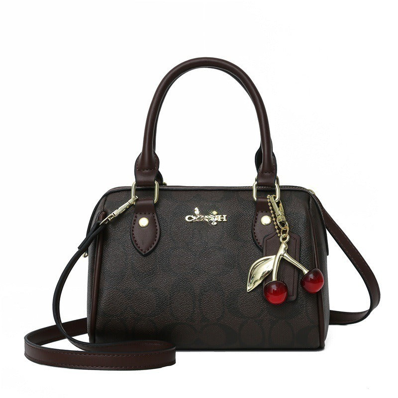 Mini Rowan Crossbody Bag In Signature Canvas